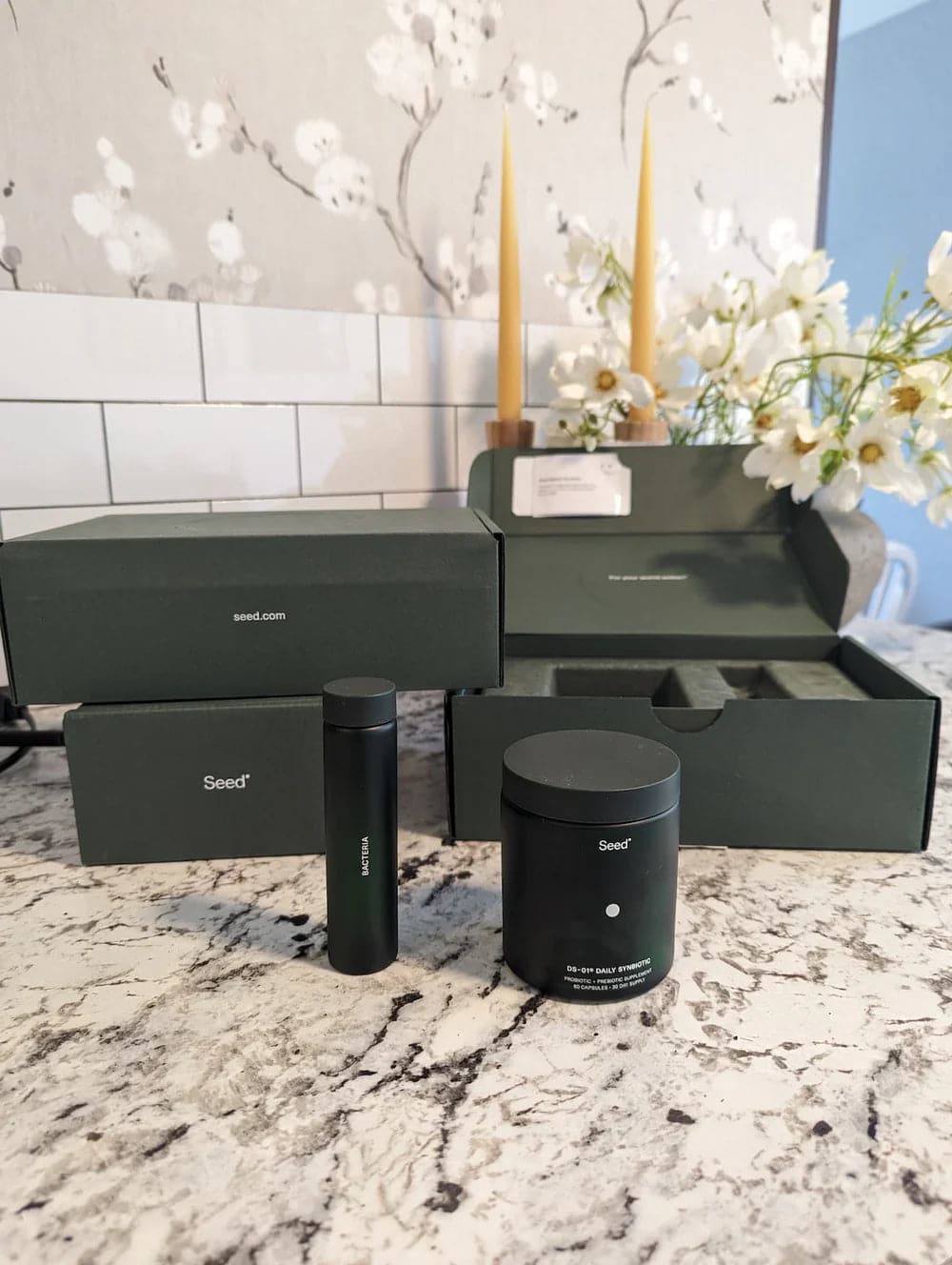 A comparison image of Seed vs Cymbiotika probiotics.