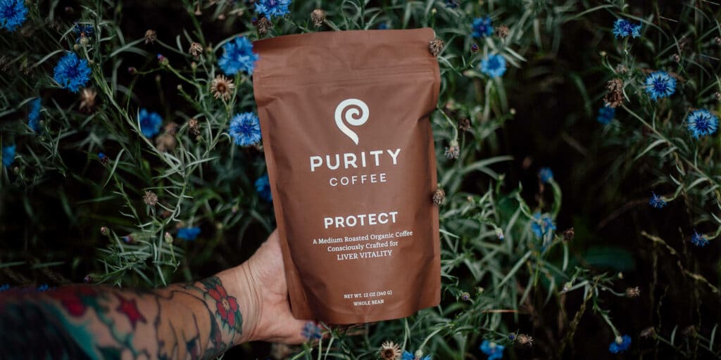 Purity coffee reviews from green coffee beans and arabica coffee beans and a tea bag