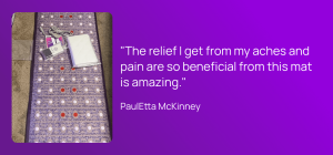 a woman using the sparklemats pemf mat to improve aches and pains in the body
