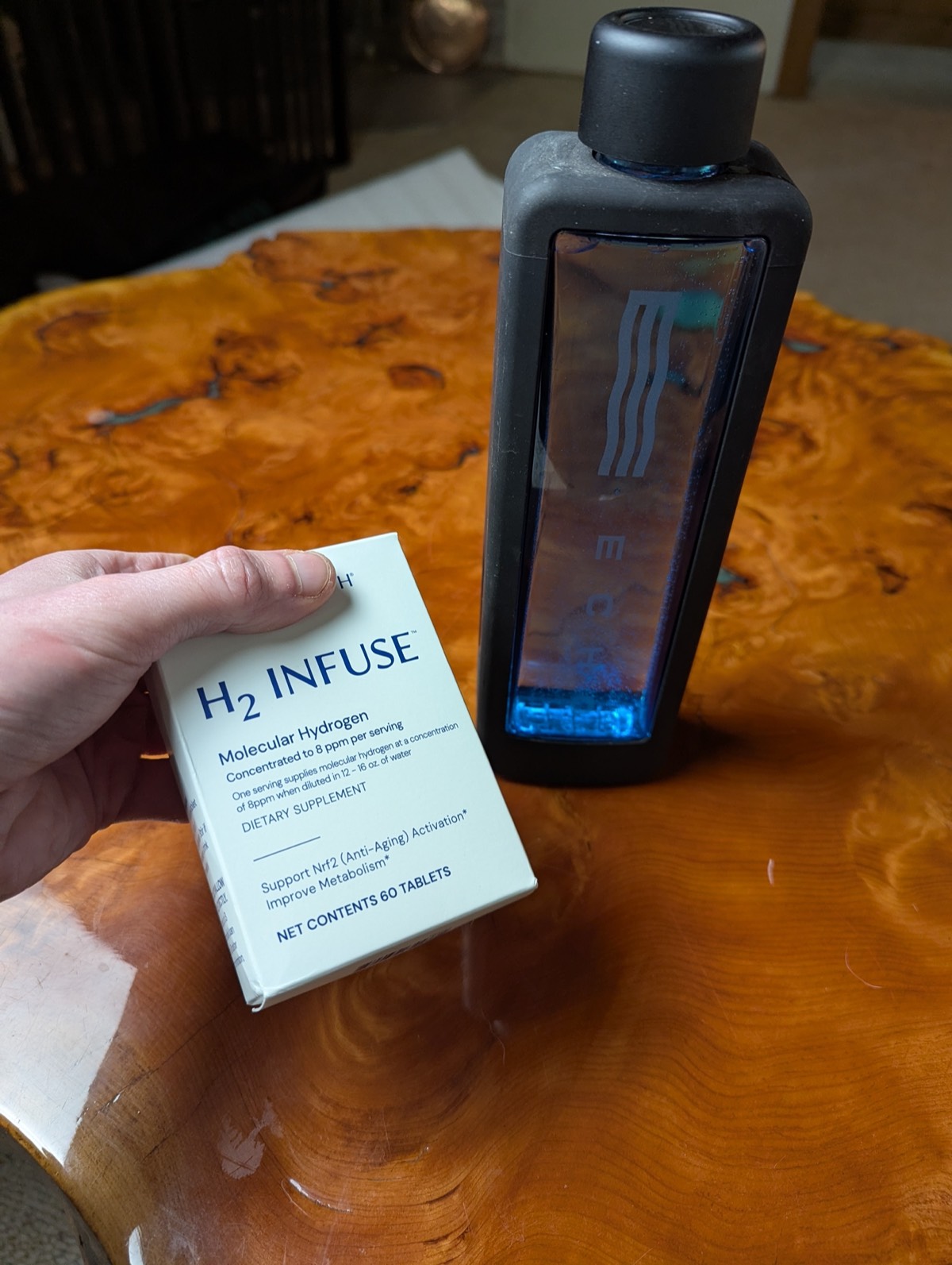 echo hydrogen water bottle next to hydrogen tablets