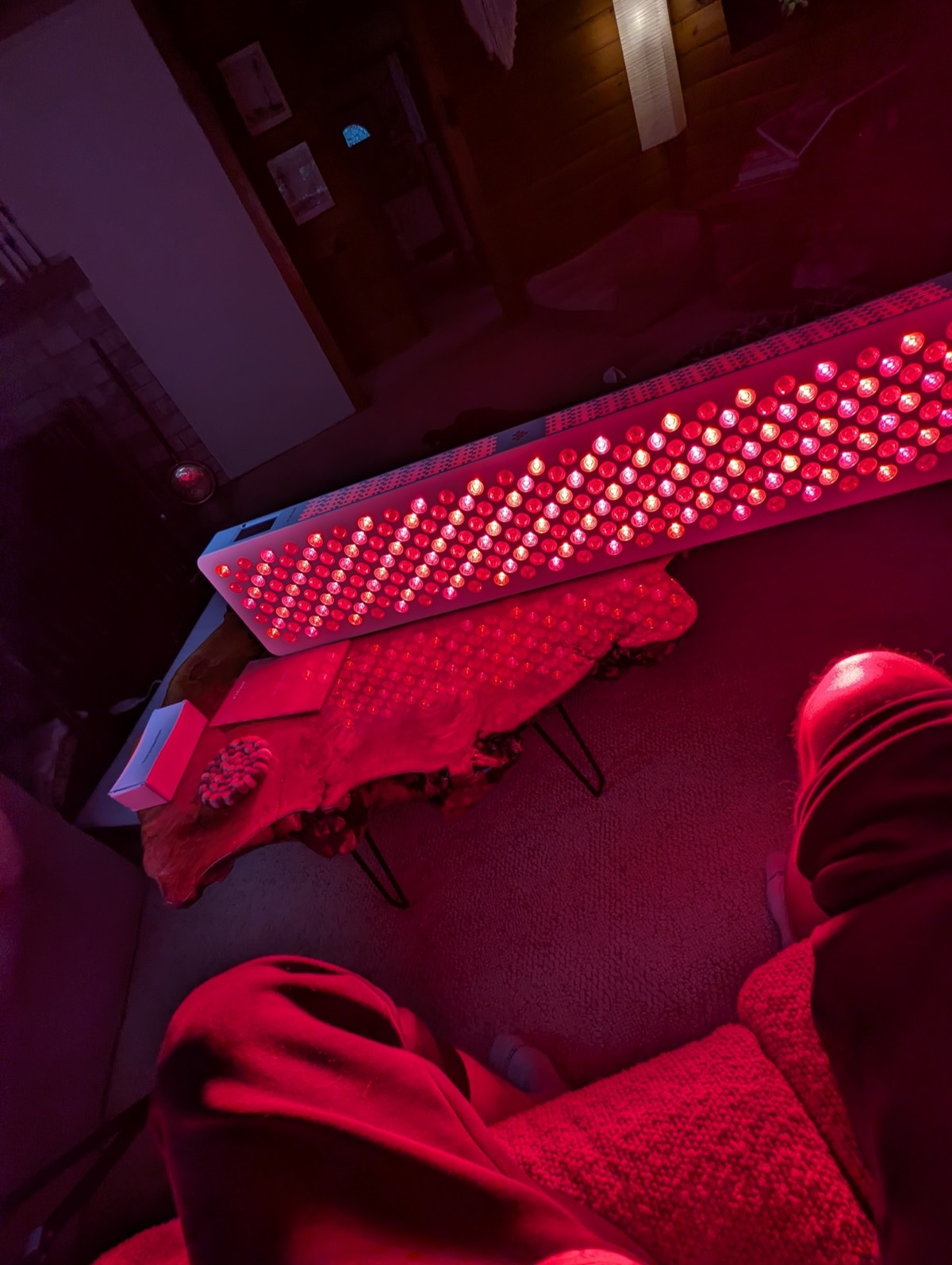 half body red light therapy panel on daryls knees (infraredi)