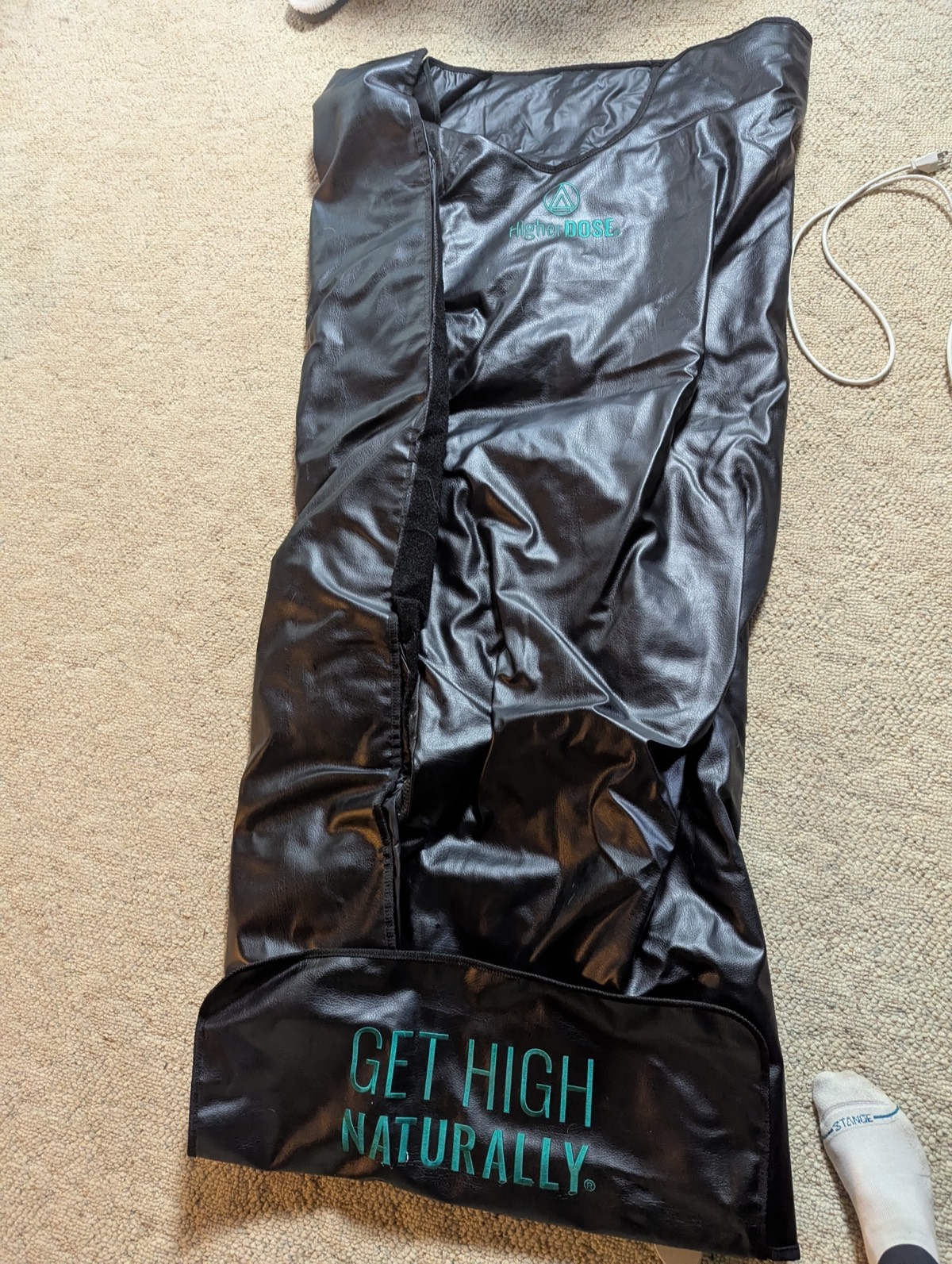 higherdose sauna blanket on my floor for review
