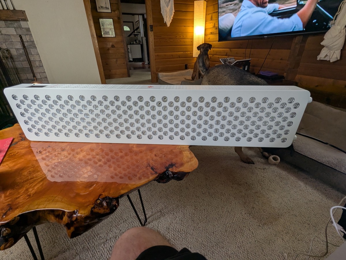 infraredi red light therapy panel on the side of the table