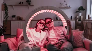 red light therapy and rosacea while a couple sit in the living room