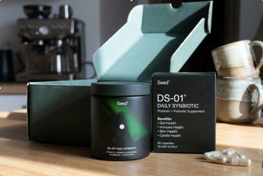 Seed DS-01 bottle resting on a clean bathroom counter, highlighting its place in a skincare routine.