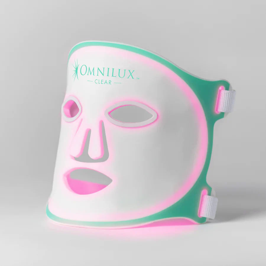 The Omnilux Clear led red light therapy mask, which combines blue and red light for acne treatment.