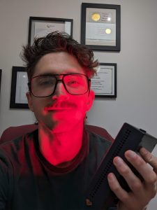 trying the best portable red light device on my face
